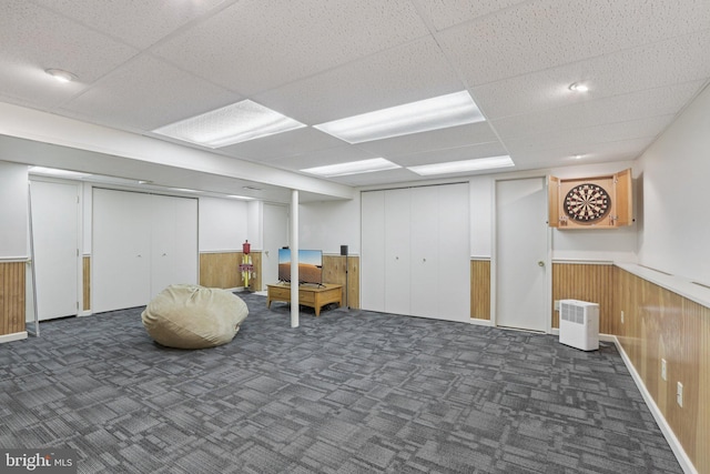 611 Hillcrest Dr, Perkasie, PA 18944 - finished basement with dark colored carpet, wainscoting, wood walls, and a drop ceiling