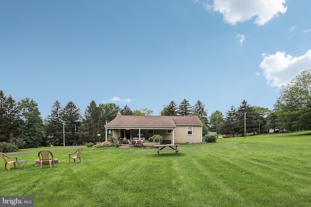 611 Hillcrest Dr, Perkasie, PA 18944 - view of grassy yard with view of scattered trees and an outdoor fire pit