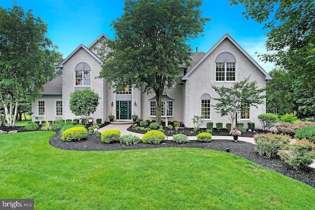 14 Canaday Ct, Belle Mead, NJ 08502 - view of front of house with a front yard and stucco siding