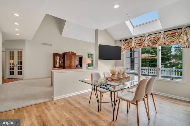 14 Canaday Ct, Belle Mead, NJ 08502 - dining room featuring a skylight, light wood-style flooring, recessed lighting, and high vaulted ceiling