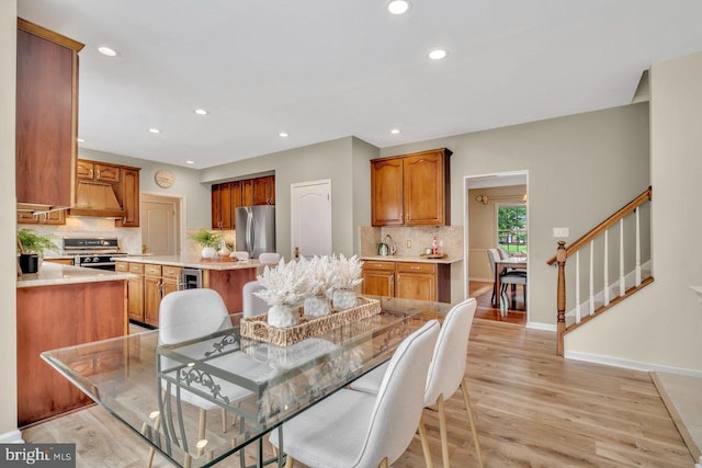 14 Canaday Ct, Belle Mead, NJ 08502 - dining space featuring recessed lighting, light wood-type flooring, stairway, and wine cooler