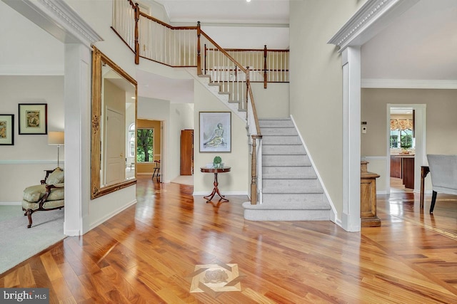14 Canaday Ct, Belle Mead, NJ 08502 - stairs with plenty of natural light, wood finished floors, and ornamental molding