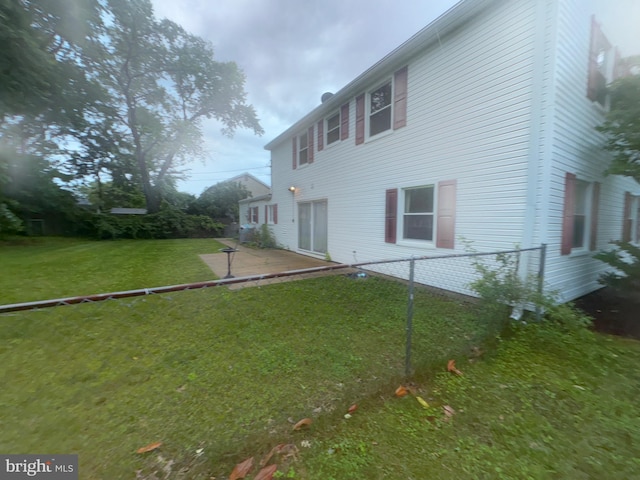 2713 Federal Ln, Bowie, MD 20715 - back of property featuring a yard and a patio area