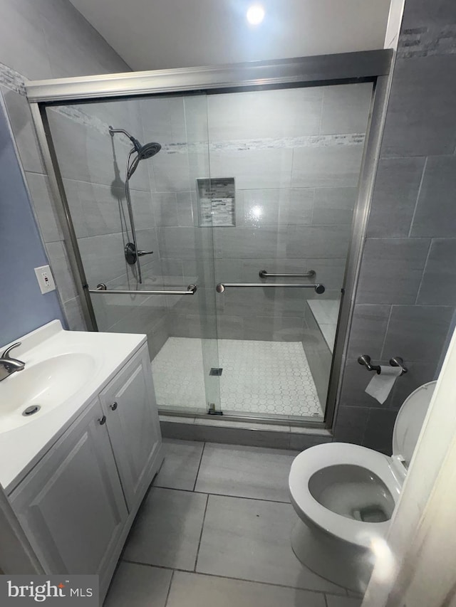 2713 Federal Ln, Bowie, MD 20715 - bathroom featuring vanity, a shower stall, and tile patterned flooring