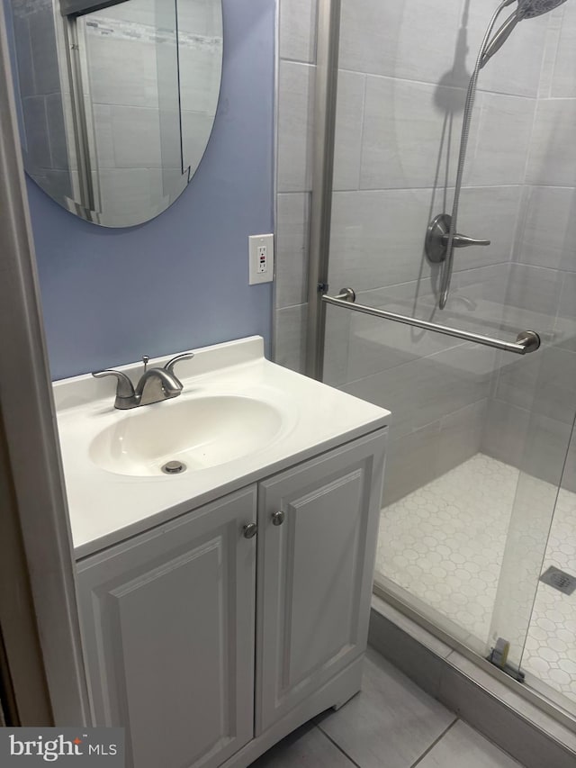 2713 Federal Ln, Bowie, MD 20715 - full bath featuring a shower stall, vanity, and tile patterned flooring