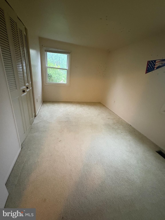 2713 Federal Ln, Bowie, MD 20715 - unfurnished bedroom featuring light colored carpet