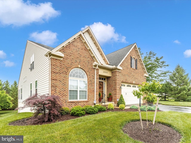 10600 Edwardian Ln, New Market, MD 21774 - traditional-style home with brick siding, an attached garage, driveway, and a front lawn