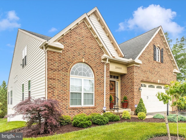10600 Edwardian Ln, New Market, MD 21774 - traditional-style house featuring brick siding, a garage, roof with shingles, and concrete driveway