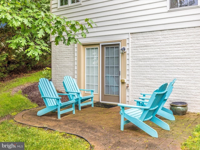 10600 Edwardian Ln, New Market, MD 21774 - entrance to property featuring brick siding and a patio area