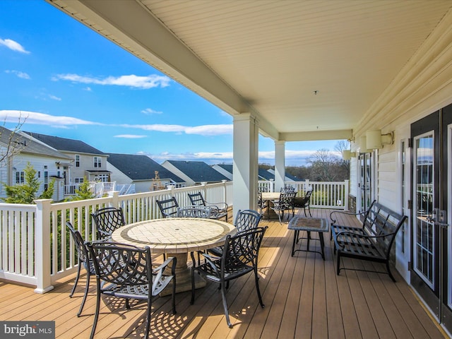 10600 Edwardian Ln, New Market, MD 21774 - wooden terrace featuring outdoor dining space and a residential view