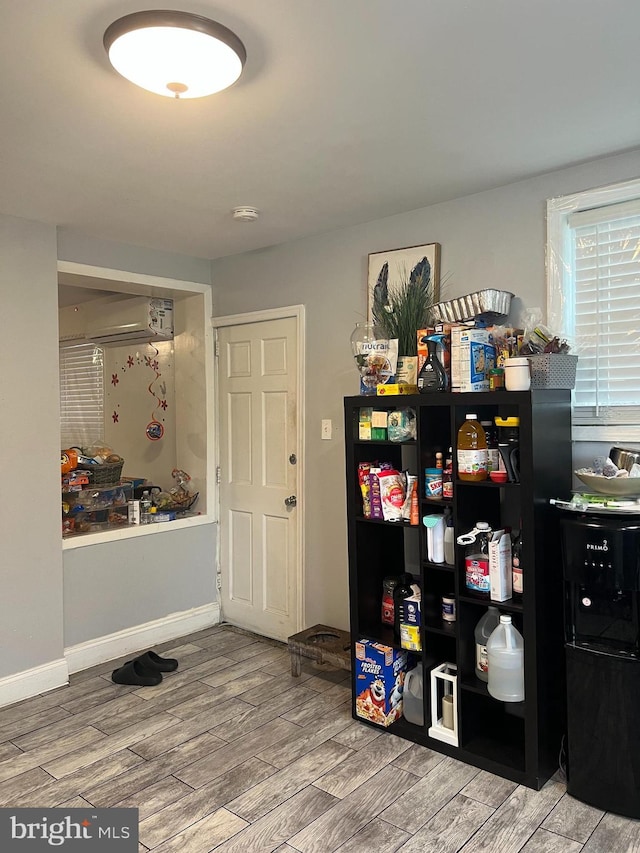 2612 E Somerset St, Philadelphia, PA 19134 - entryway with wood finished floors and an AC wall unit