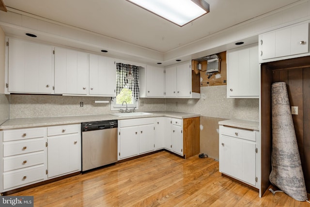 1721 Pioneer Rd, Lancaster, PA 17602 - kitchen featuring dishwasher, white cabinetry, light wood-type flooring, and tasteful backsplash