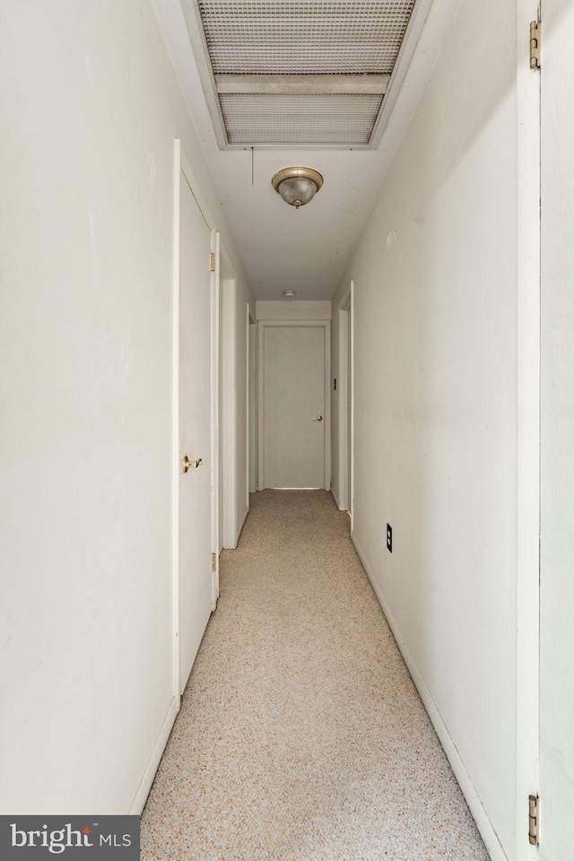 1721 Pioneer Rd, Lancaster, PA 17602 - hallway with dark speckled floor and baseboards