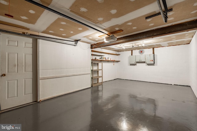 1721 Pioneer Rd, Lancaster, PA 17602 - garage with concrete block wall and a garage door opener