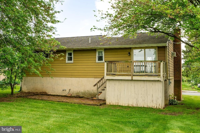 1721 Pioneer Rd, Lancaster, PA 17602 - rear view of house featuring a yard, stairs, and a chimney