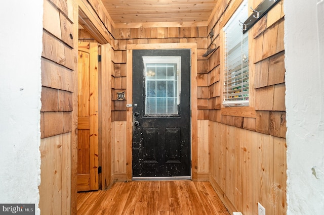 1015 N Duke St, York, PA 17404 - doorway to outside featuring wood walls, wood finished floors, and wooden ceiling
