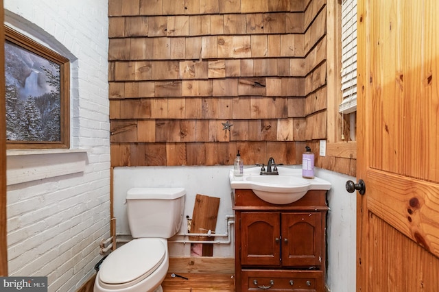 1015 N Duke St, York, PA 17404 - half bathroom featuring vanity and wood finished floors