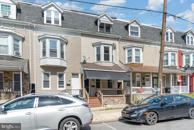 1015 N Duke St, York, PA 17404 - view of front of house featuring covered porch and mansard roof