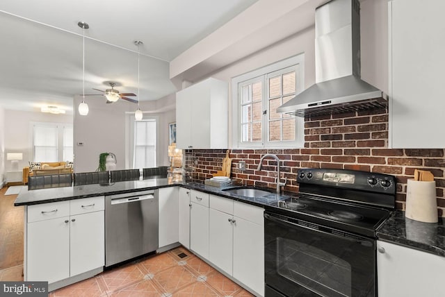 745 Gresham Pl NW, Washington, DC 20001 - kitchen featuring stainless steel dishwasher, black / electric stove, wall chimney range hood, a peninsula, and white cabinets