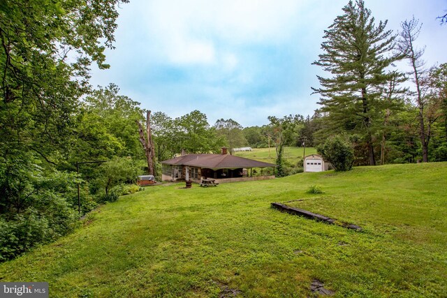 35 Strimples Mill Rd, Stockton, NJ 08559 - view of green lawn featuring a wooded view