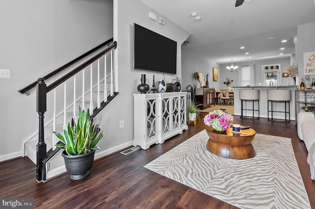 922 S Macon St, Baltimore, MD 21224 - living area featuring wood finished floors, recessed lighting, a chandelier, and stairs