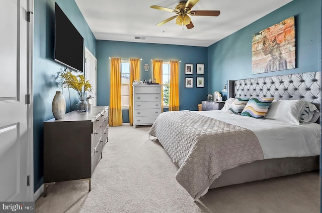 922 S Macon St, Baltimore, MD 21224 - bedroom featuring light colored carpet and a ceiling fan