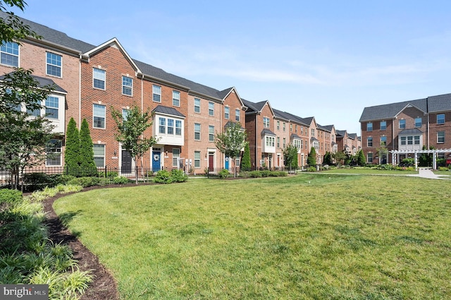 922 S Macon St, Baltimore, MD 21224 - view of property's community with a residential view and a lawn