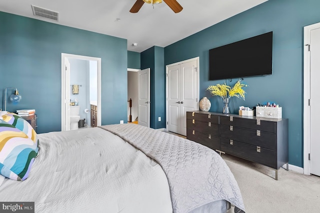 922 S Macon St, Baltimore, MD 21224 - bedroom featuring carpet floors, a closet, a ceiling fan, and ensuite bathroom