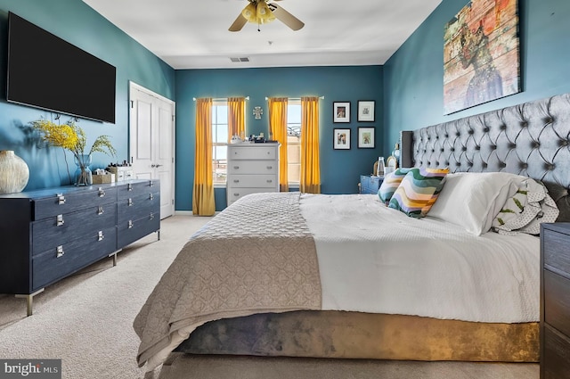 922 S Macon St, Baltimore, MD 21224 - bedroom with carpet floors, a ceiling fan, and a closet