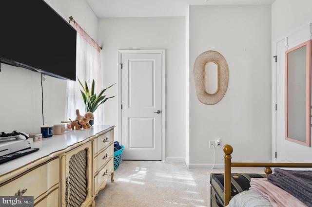922 S Macon St, Baltimore, MD 21224 - bedroom with light carpet and baseboards