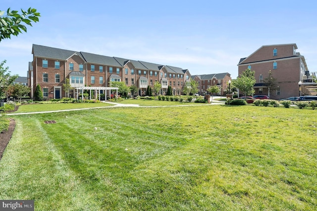 922 S Macon St, Baltimore, MD 21224 - view of community with a residential view and a lawn