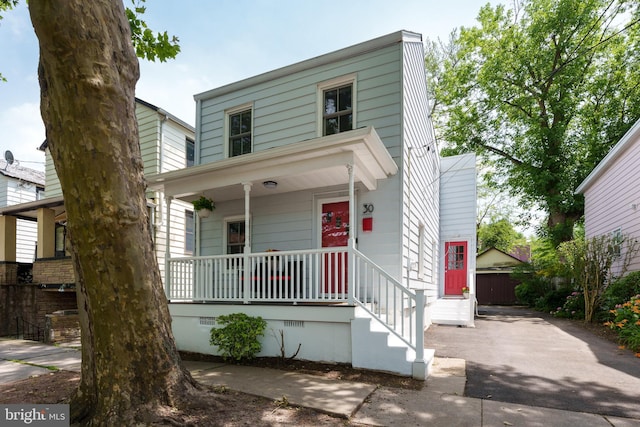 30 Lytle St, Princeton, NJ 08542 - view of front facade featuring covered porch, driveway, and crawl space
