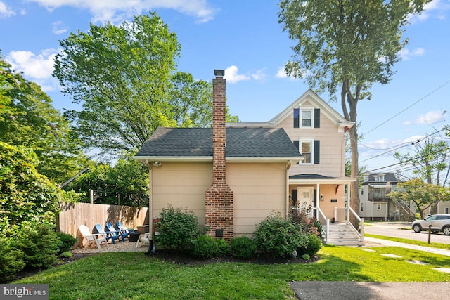 127 Fowler Ave, Haddonfield, NJ 08033 - view of front of house with a shingled roof and a chimney