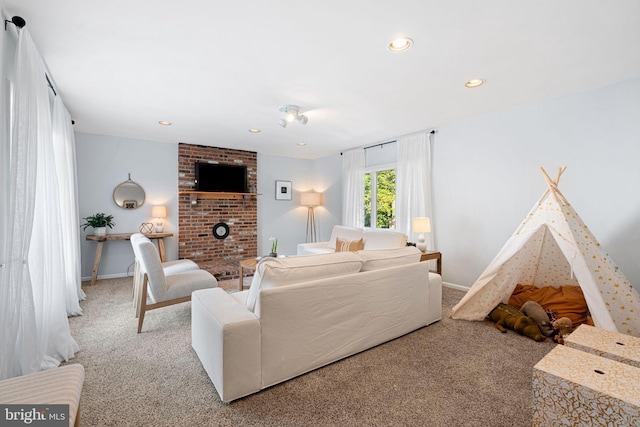 127 Fowler Ave, Haddonfield, NJ 08033 - carpeted living room featuring recessed lighting and a brick fireplace