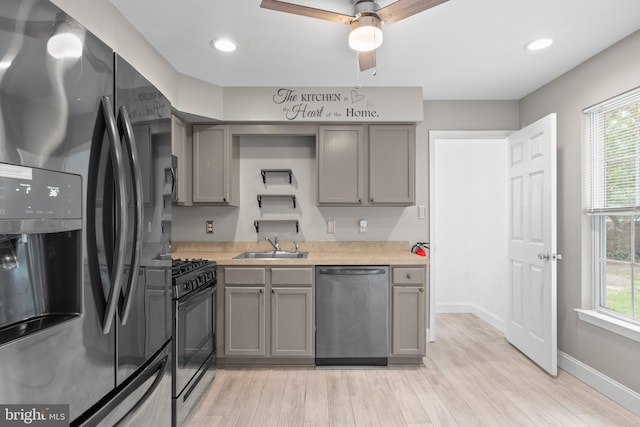 248 Chestnut Ave, West Berlin, NJ 08091 - kitchen featuring fridge with ice dispenser, dishwasher, gray cabinetry, black gas stove, and light wood finished floors
