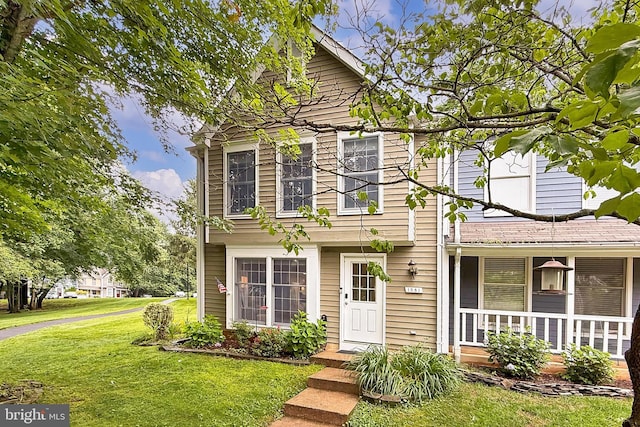 1581 Poplar Grove Dr, Reston, VA 20194 - view of front of property with a front lawn and covered porch