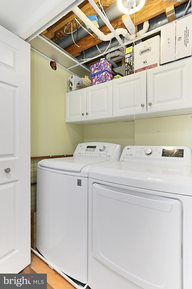 1581 Poplar Grove Dr, Reston, VA 20194 - washroom featuring washing machine and clothes dryer and cabinet space