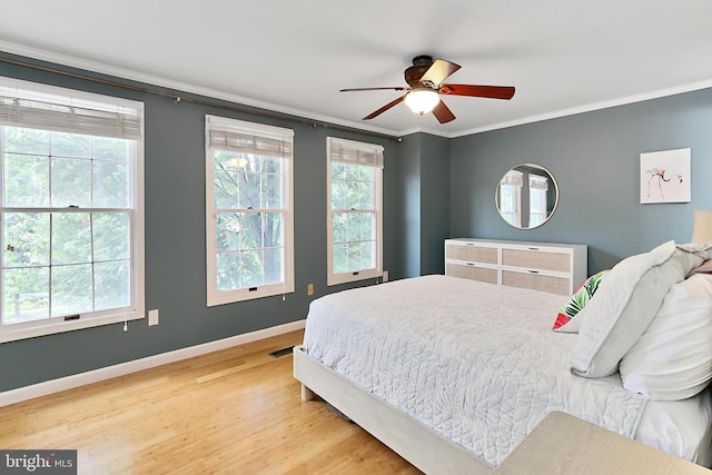 1581 Poplar Grove Dr, Reston, VA 20194 - bedroom featuring wood finished floors, crown molding, and ceiling fan