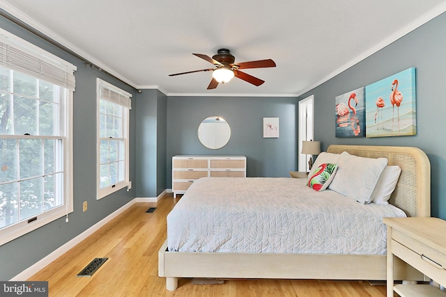 1581 Poplar Grove Dr, Reston, VA 20194 - bedroom featuring crown molding, wood finished floors, and a ceiling fan