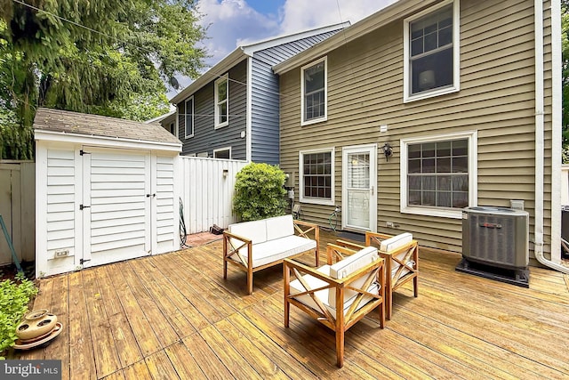 1581 Poplar Grove Dr, Reston, VA 20194 - wooden deck featuring outdoor lounge area and a shed