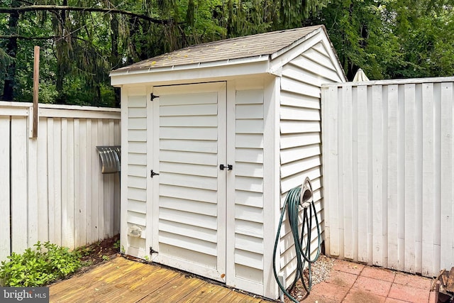 1581 Poplar Grove Dr, Reston, VA 20194 - view of shed featuring view of wooded area