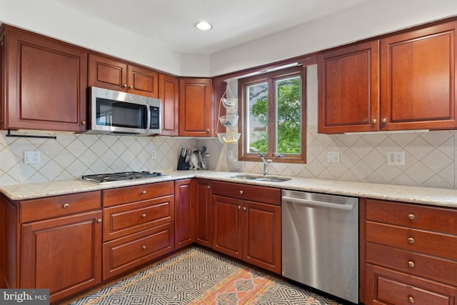 11 Creek Rd, Southampton, PA 18966 - kitchen with appliances with stainless steel finishes, backsplash, light stone counters, and recessed lighting