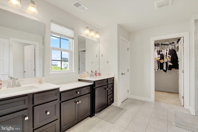 33 Winifred, Hanover, PA 17331 - bathroom featuring vanity, a spacious closet, and tile patterned flooring