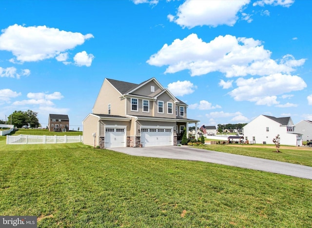 33 Winifred, Hanover, PA 17331 - view of front of home featuring stone siding, an attached garage, and driveway