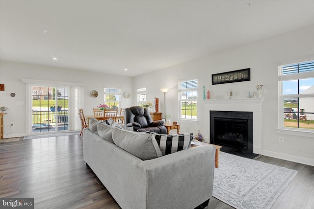 33 Winifred, Hanover, PA 17331 - living room featuring plenty of natural light, dark wood-type flooring, a fireplace with flush hearth, and recessed lighting