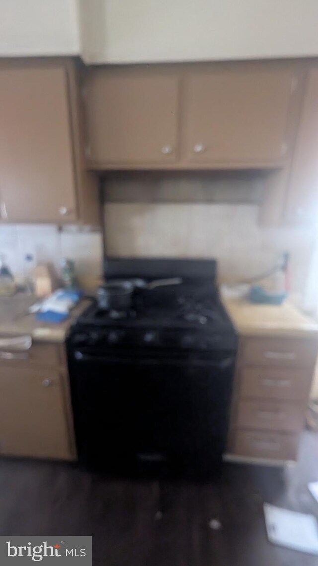 311 Calhoun St, Baltimore, MD 21223 - kitchen view of black range with gas stovetop