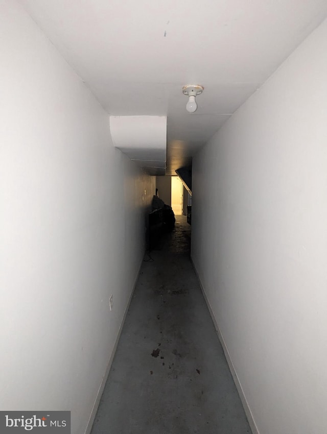 311 Calhoun St, Baltimore, MD 21223 - hall featuring unfinished concrete flooring