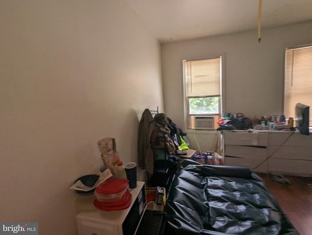 311 Calhoun St, Baltimore, MD 21223 - bedroom with cooling unit and wood finished floors