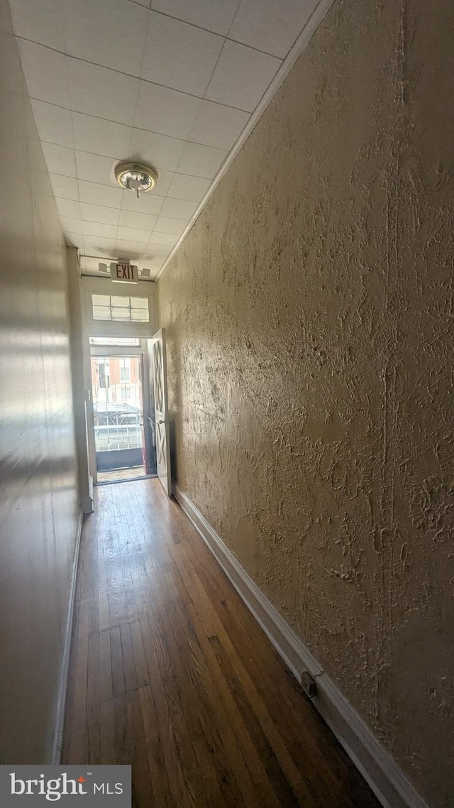311 Calhoun St, Baltimore, MD 21223 - hall with hardwood / wood-style flooring and a textured wall