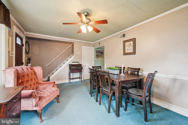 1318 Morgan Ave, Cinnaminson, NJ 08077 - carpeted dining space with a ceiling fan, stairs, and crown molding